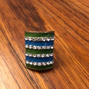 Green and blue golden ring with diamonds